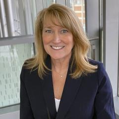 Woman in blue jacket