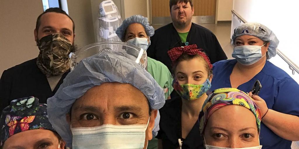Eduardo Cardenas with a group of medical people