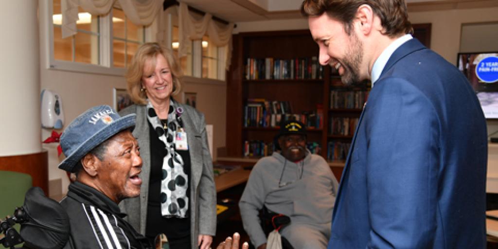 Congressman Joe Cunningham meets with Community Living Center residents during a tour of the Ralph H. Johnson VA Medical Center Feb. 1. The CLC recently received a 5-star rating for quality measures and staffing. (Photo by James Arrowood)