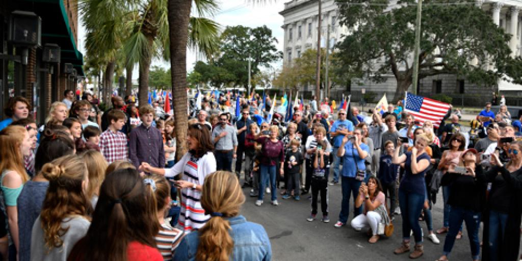 A crowd watches the choir from Laing Middle School sing the National Anthem at the 2018 Charleston Veterans Day Parade. The Ralph H. Johnson VA Medical Center sponsored the annual event held on Nov. 4 this year.