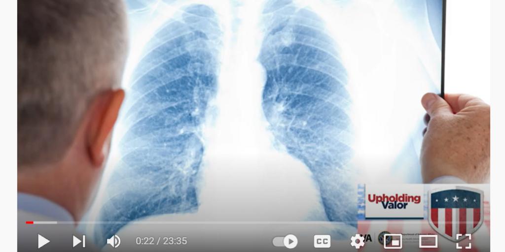 Medical person looking at an X-ray