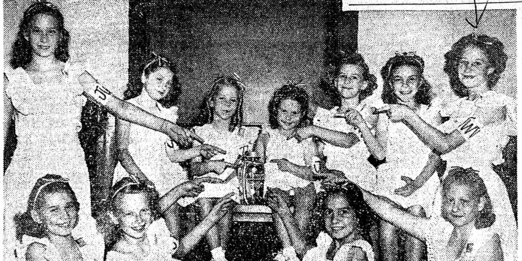 A group of girls posing with their donation