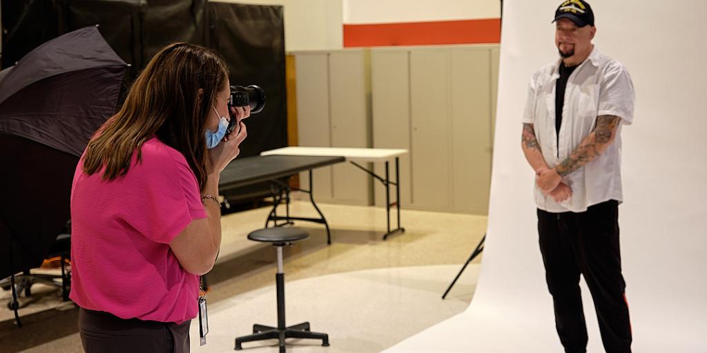 Jennifer Roy, public affairs specialist with the Dallas Regional Office of Public Affairs, photographs fellow Navy Veteran, Michael Smith