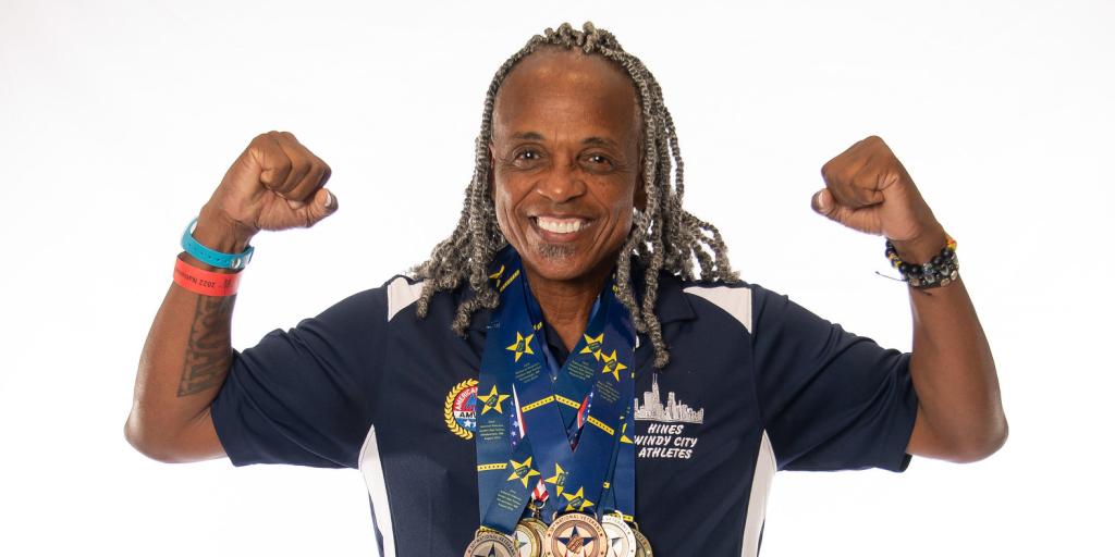 Franklin Newson, of Naperville, Illinois, poses with some of his 19 medals earned during the National Veterans Golden Age Games. Newson has competed with a team from Edward Hines, Jr. VA Hospital since 2017, and won 7 medals during the Sioux Falls, South Dakota, games in July 2022.
