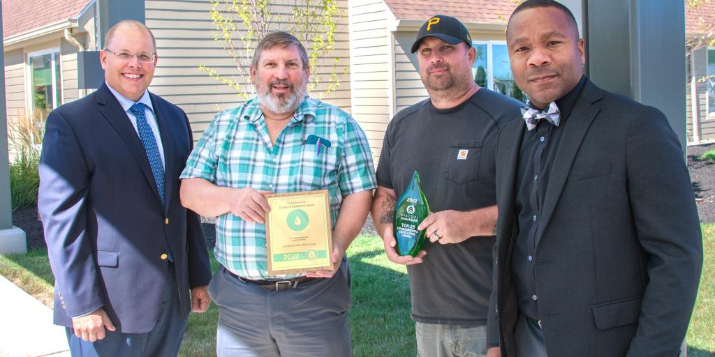 Erie VA Leadership and Staff with Award