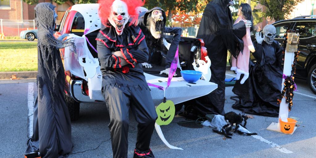 MOUNTAIN HOME, Tenn. (October 14, 2022)— JHQVAMC employees pass out candy during VA Employee’s Association annual Trunk or Treat event October 14, 2022, at James H. Quillen VA Medical Center. (Official photograph by Cory R. Chapin)