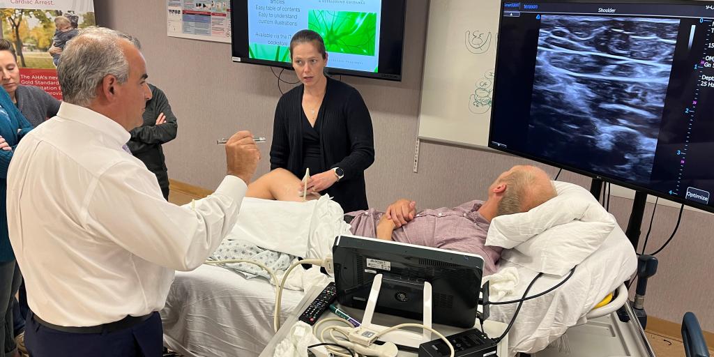 Scott Redmond, SRNA cannulates a simulated vessel using ultrasound