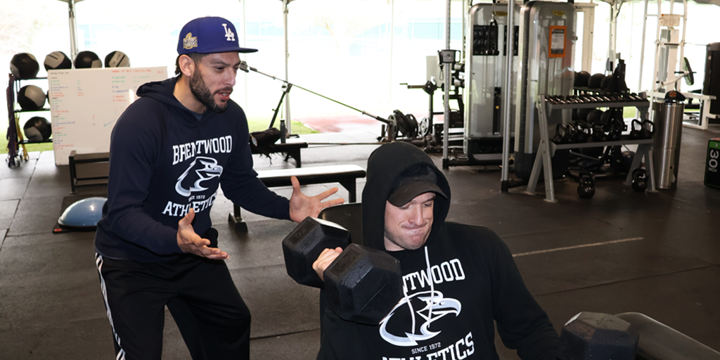 Marine Corps Veterans Raymond Navarro (left) and Greg Becker (right) are fitness facilitators and coaches at the Veterans Center for Recreation and Education (VCRE) where they help their fellow Veterans enhance their physical and mental health through exercise.