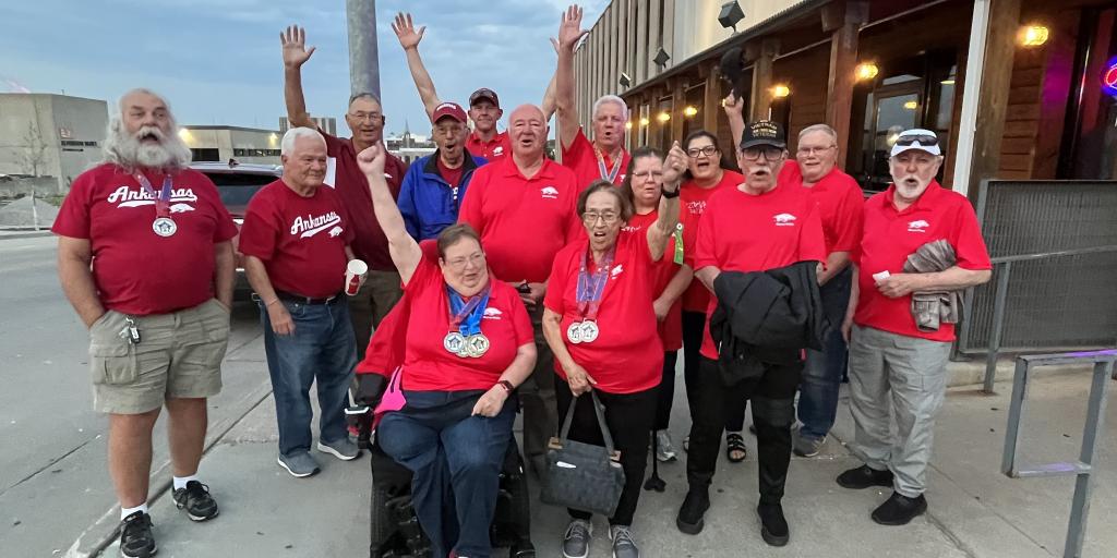 group photo of people cheering