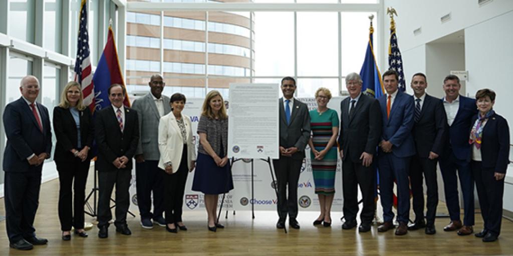 Attendees gather for a group photo with the Memorandum of Understanding at the event in Philadelphia