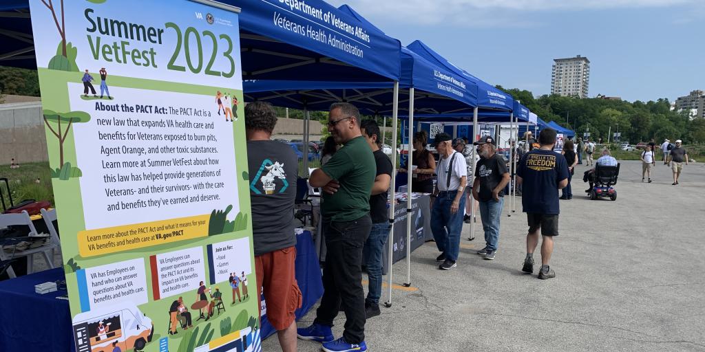 Attendees visit booths at Vet Fest
