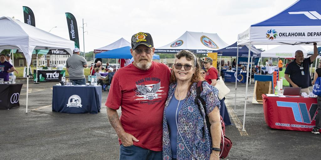 Rose Hodges (left) introduces her husband, Army Veteran Steve Hodges, to the VA Caregiver Support Team. Rose Recently completed a virtual Caregiver Support Class with the ream and traveled to the event to meet them in person.