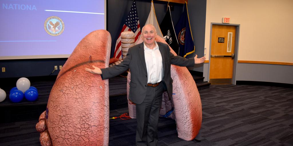 VA Providence Director Lawrence Connell with supporting National Lung Cancer Awareness month with a giant inflatable lung
