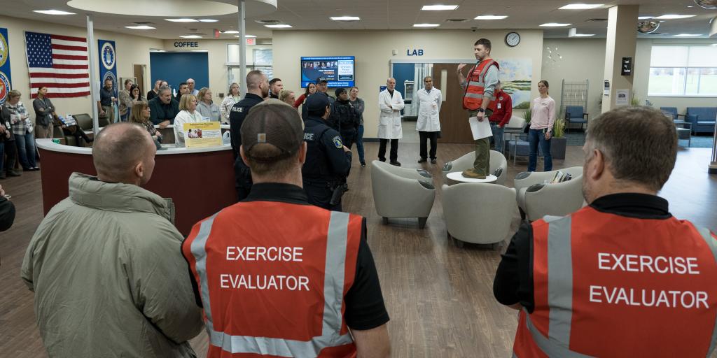 Battle Creek VA Medical Center's Emergency Management Service provide an overview of scenarios and goal of an active shooter exercise to healthcare providers and emergency responders at the Lansing VA Clinic, Friday, December 1. The goal of the exercises was to reinforce the abilities of healthcare providers and local emergency responders to react in adverse situations, protecting VA staff and Veterans they serve. (Photo by Abraham Essenmacher)