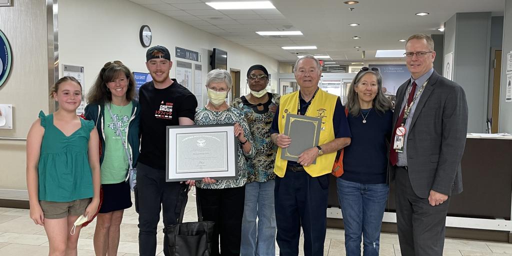 Veteran William Pinkleton receives President's Volunteer Service Award certificate.