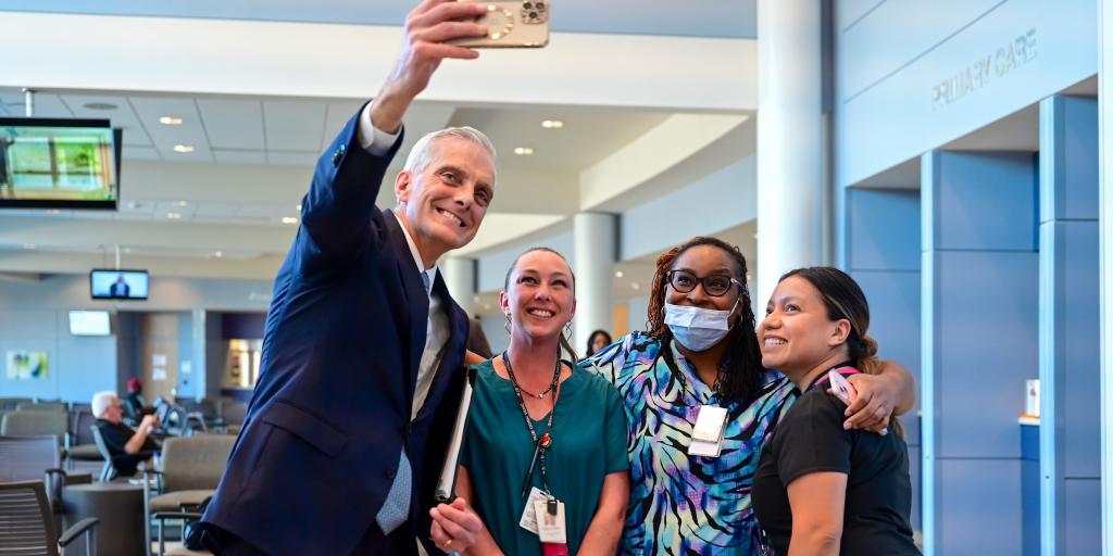 Denis McDonough takes a selfie with staff of the Columbia VAHCS’ Greenville Community-Based Outpatient Center.
