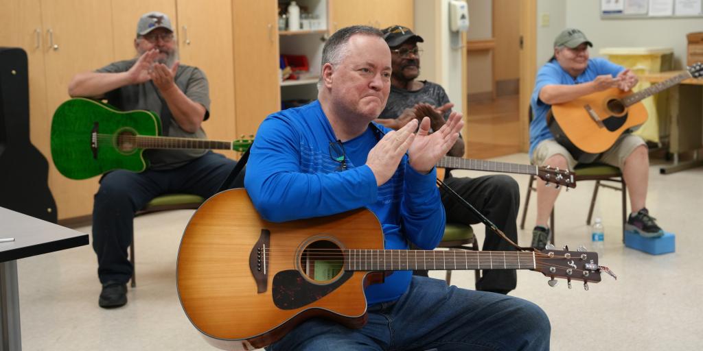 Veterans receive guitars donated to Music Therapy Program
