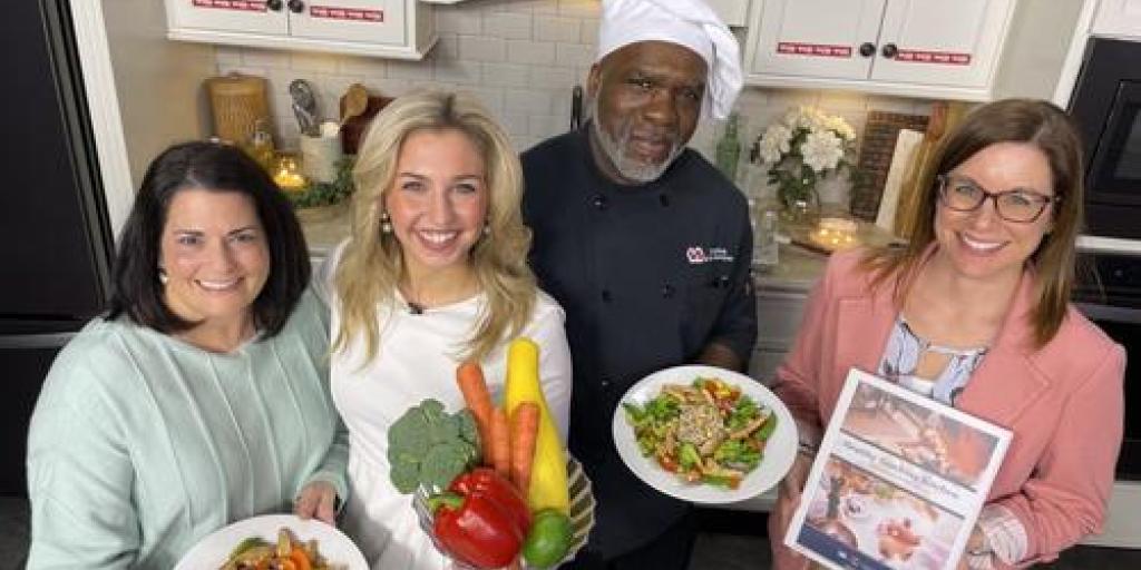 Amanda Hite, Laura Vasbinder, Chef Rubin Collins, standing in Altoona VAMC's Healthy Test Kitchen
