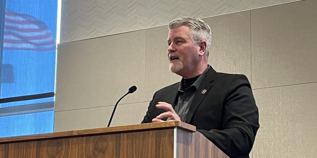 Dave Funkhouser speaking at podium.