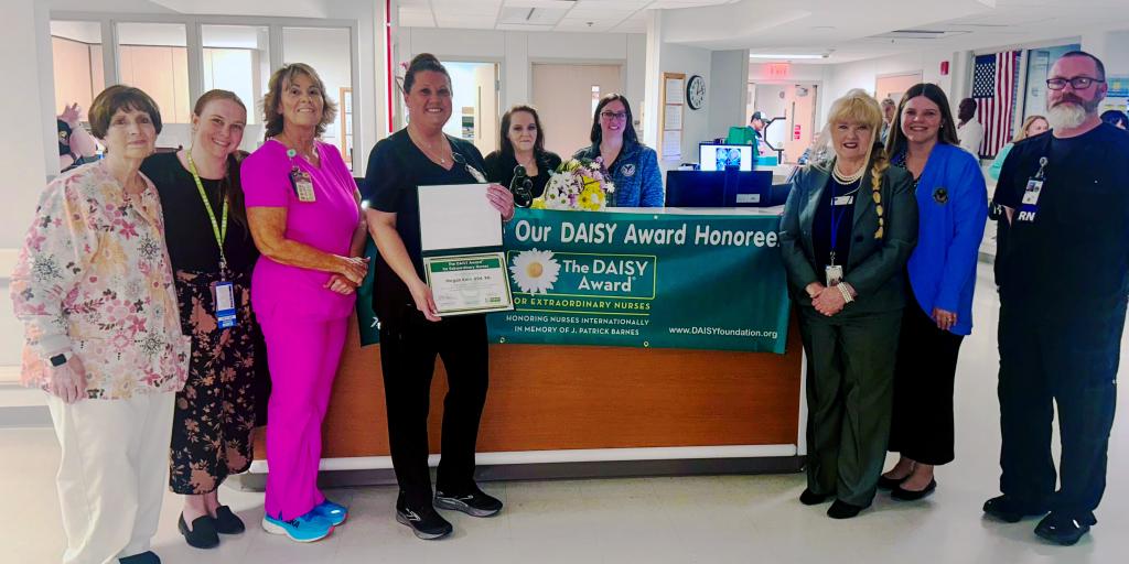 Nurse presented with Daisy Award.