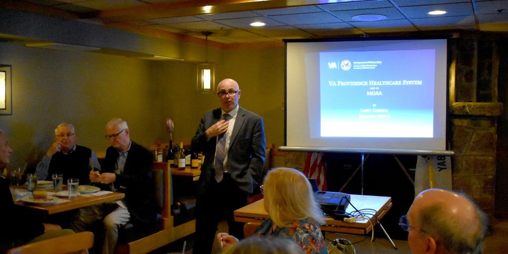 Director Lawrence Connell briefs MOAA members in North Kingstown, RI.