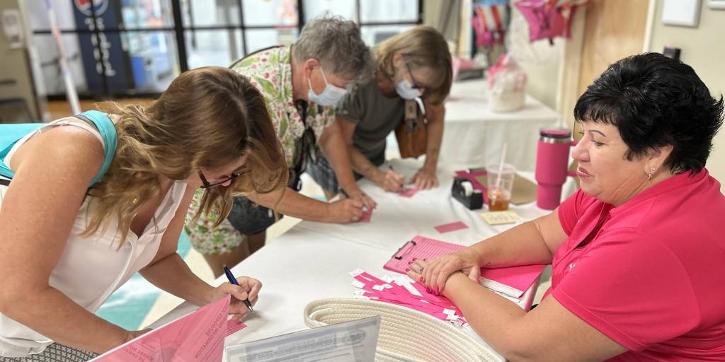 Women Veterans register for the PACT Act event that was held on June 29, 2024.