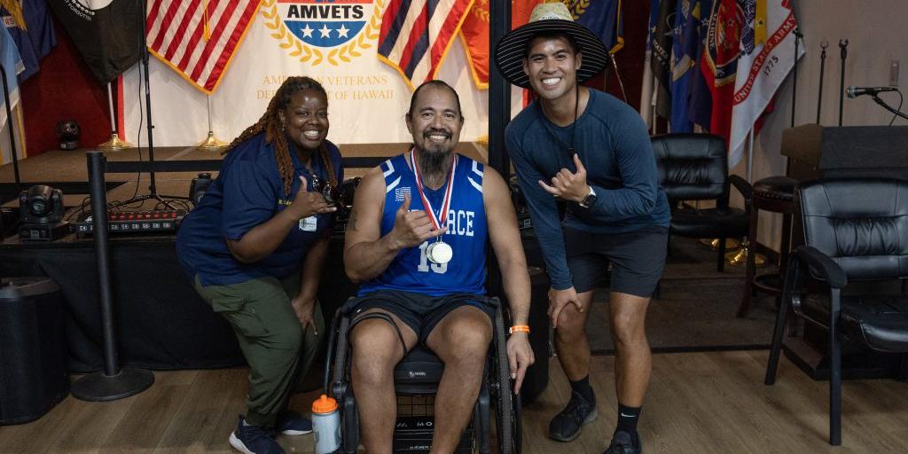 Ret. Chief Master Sgt. Garrett Kuwada with VAPIHCS Recreation Therapists.