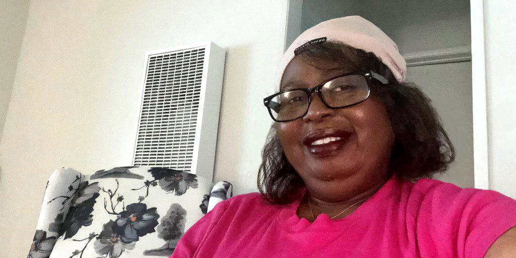 Woman smiling.