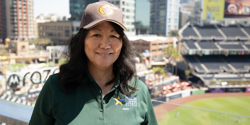 female wearing ball cap