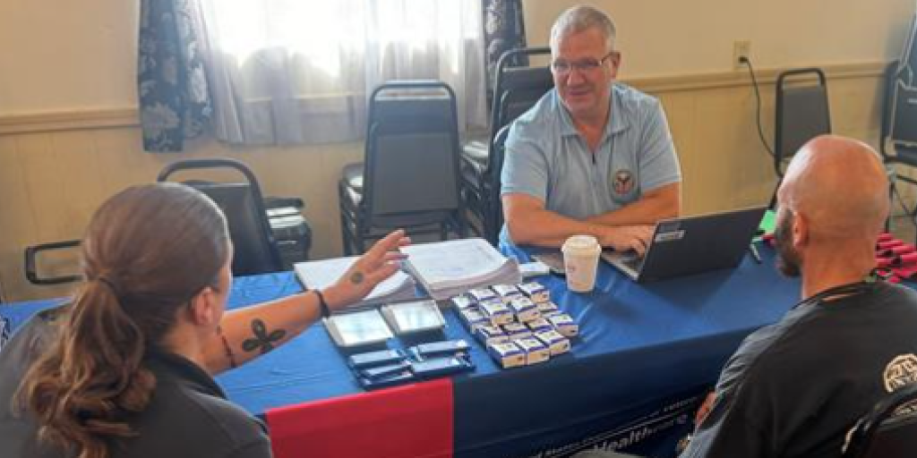 VA Providence's Ron Ptaszenski speaks to Veterans about the PACT Act during the event.