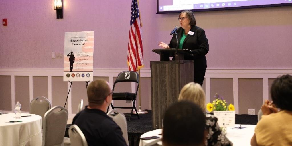 Ms. Margaret Kabat, Chief of Staff for the U.S. Department of Veterans Affairs stood in a room filled with suicide prevention community partners.