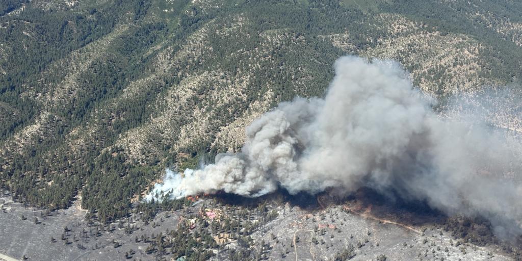 Arial view of the Davis Fire as smoke covers the hill side.