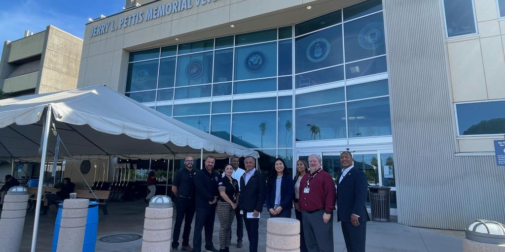 Jerry L. Pettis Memorial Veterans Hospital staff and Stater Bros. representatives in front of the hospital.