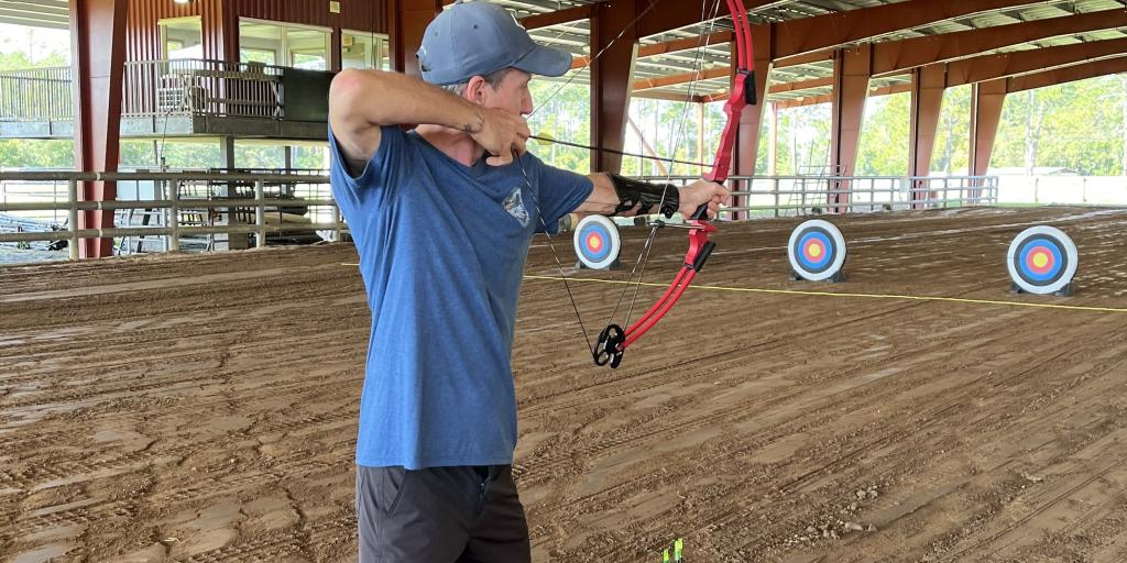 Christian Villarose excelling in archery during the Adaptive Sports Summer Clinic in St. Augustine, FL.
