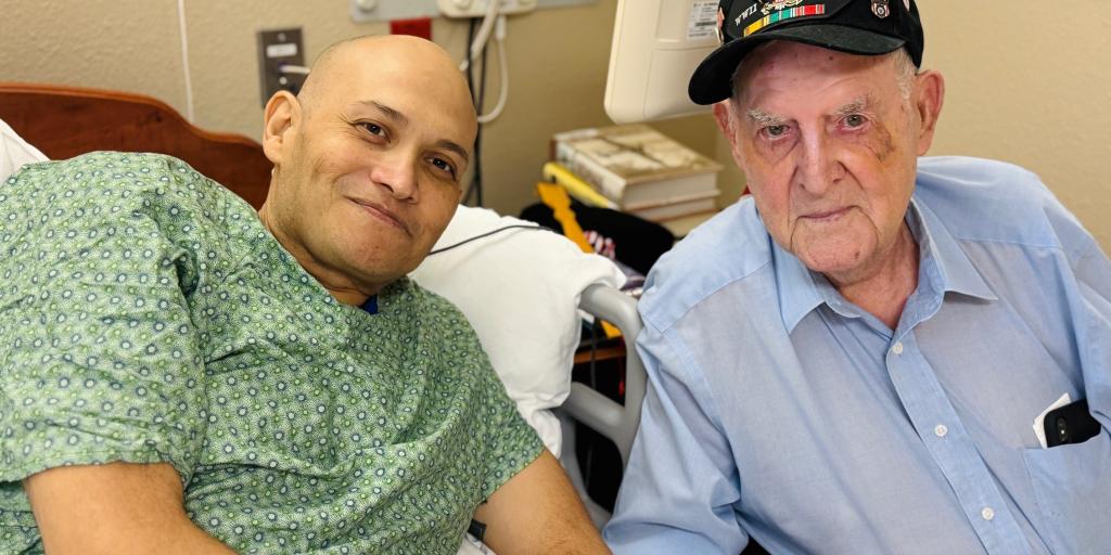 US Navy and Army Veteran Jose Luis "Joey" Cabezuela III (L) and WWII U.S. Navy Veteran J.L. Stevens connect at the local VA health care system.