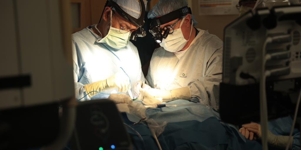 Doctors performing a surgical procedure