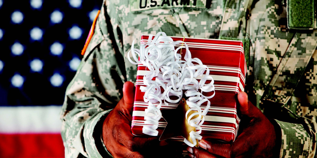 Soldier holding a gift
