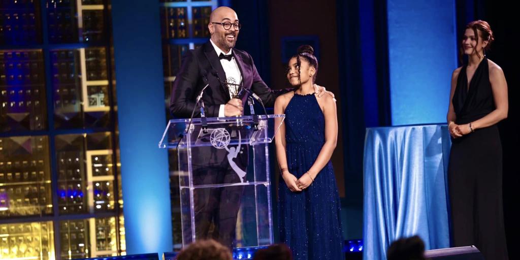 Romeo Lucchesi accepts Emmy Award with daughter Nala Lucchesi.
