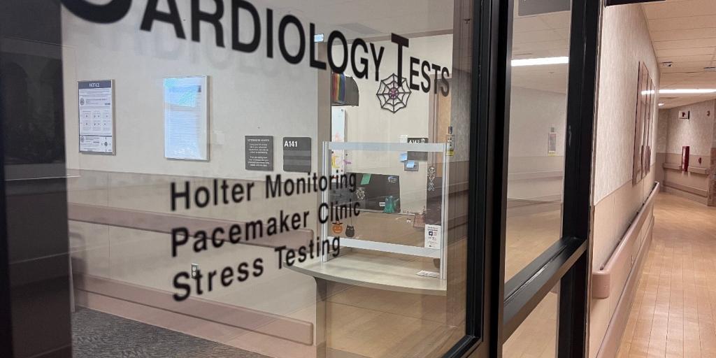 A cardiology clinic window and sign