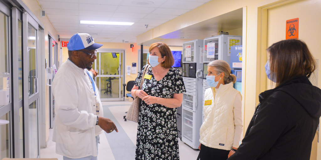 4 people talk in the intensive care unit at Fayetteville VA.