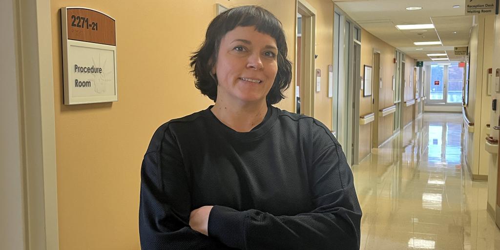nurse standing in hallway
