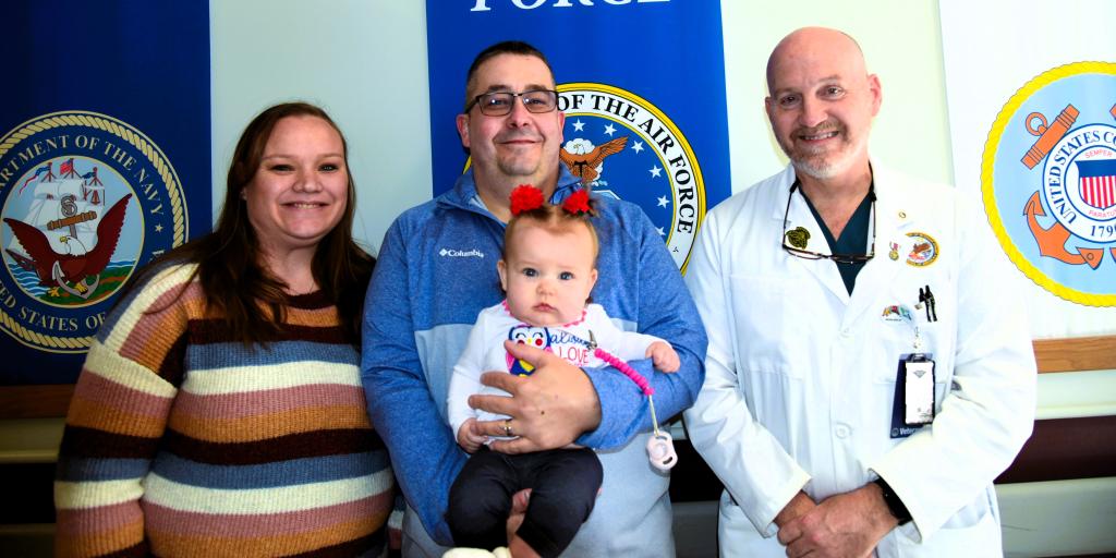 VA doctor with Veteran and family