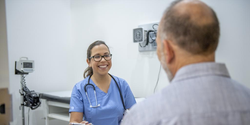 female doctor talking to patient