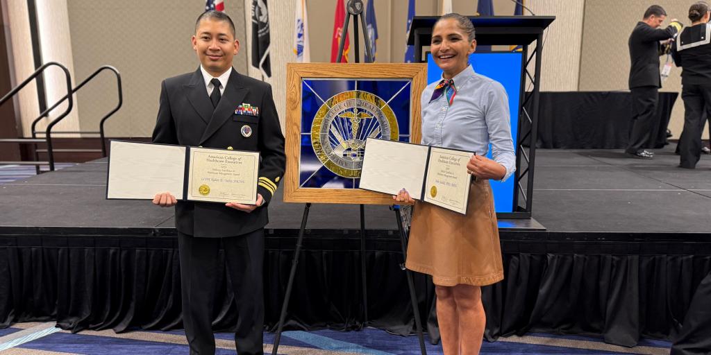 Raben Talvo (left) and Dr. Sandal (right) present their Military and Federal Excellence in Healthcare Management Awards.