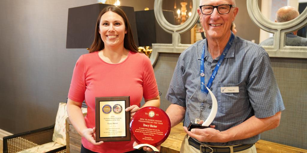 Tracy Shrier (Right) recieves his 2024 VA Fisher House Volunteer of the Year Award