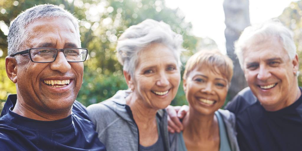An inclusive and diverse group of happy elderly individuals.