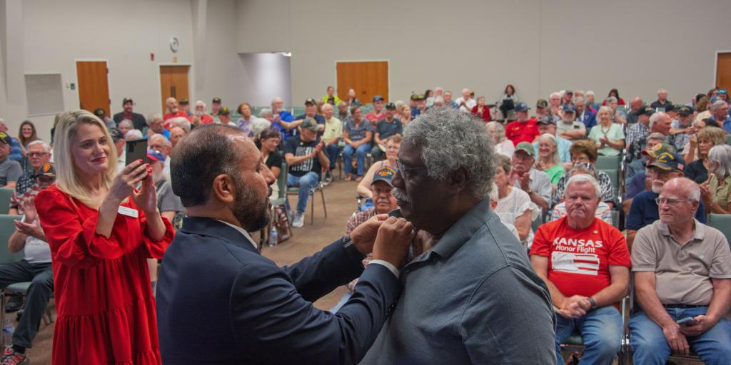 Vietnam-Era Veteran receives lapel pin in ceremony honoring the 50-year anniversary of the Vietnam War.