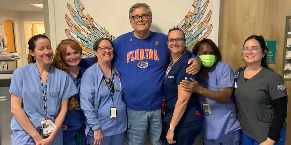 Army Veteran Wayne King with the dedicated staff of the Malcom Randall VA Medical Center's Surgical Intensive Care Unit (SICU).