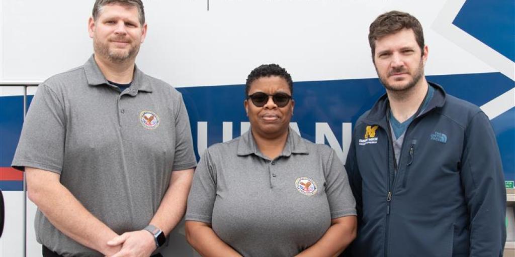 Paramedics Luke Rescorla (Left) and Tara Thomas (Middle) alongside Dr. Nathan Louras, EAS Medical Director