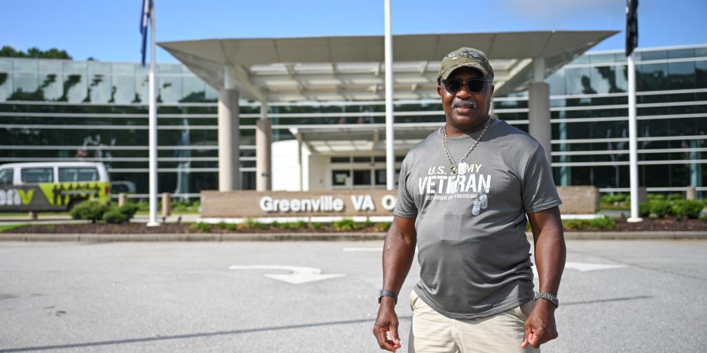 Donald Arthur poses outside the Greenville VA Outpatient Clinic.